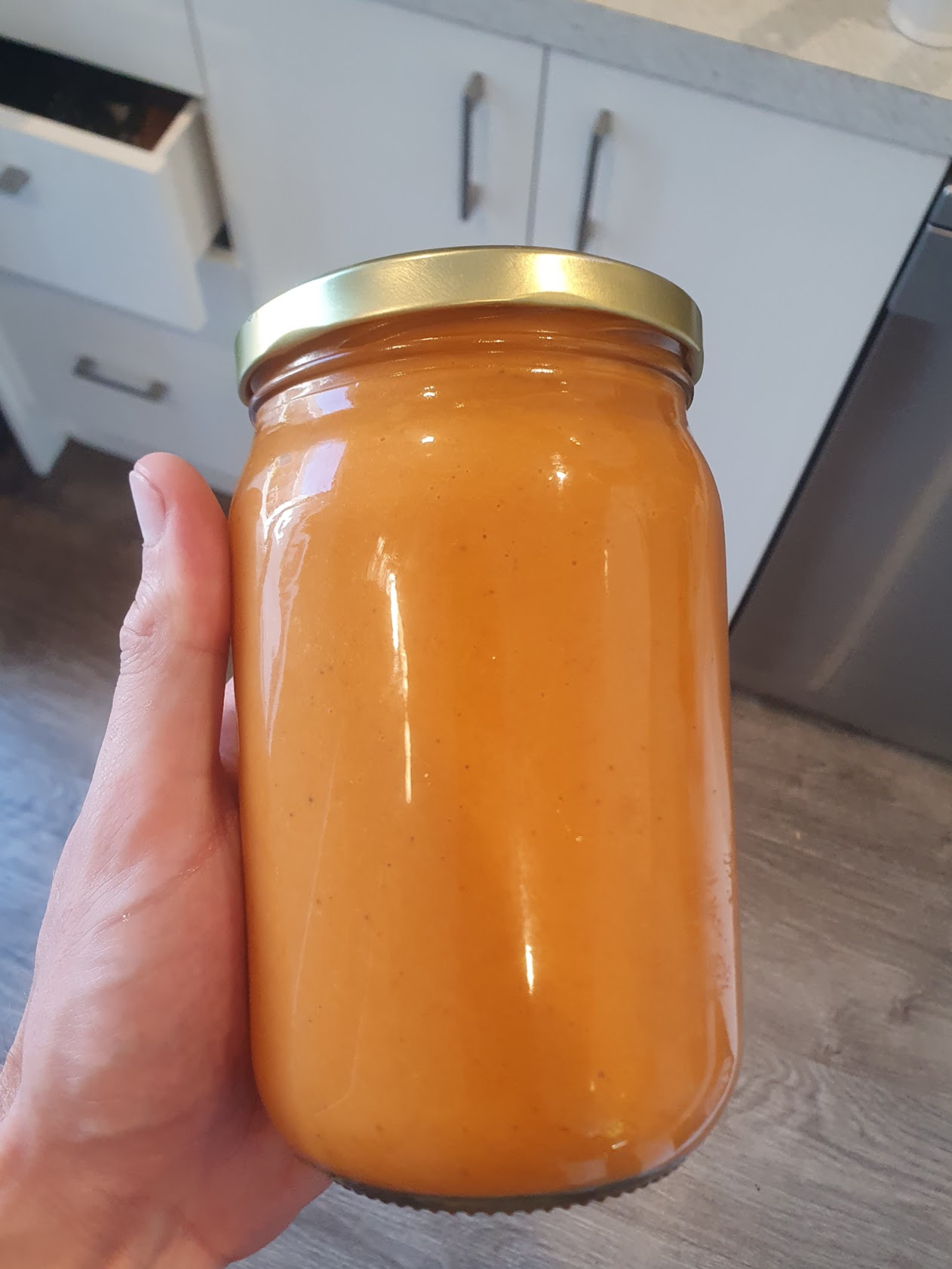 Red pepper hot sauce in jar